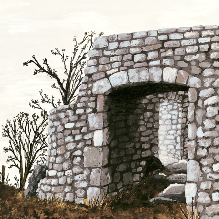 Murs de pierres maçonnées à la chaux avec arche de passage, en fin d’automne.
